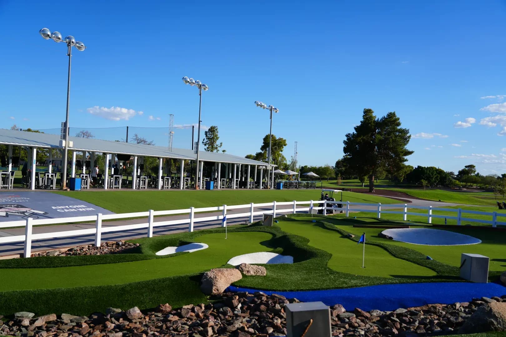 Golfers playing on the championship course at Dobson Ranch Golf Course in Mesa, Arizona with desert mountain views